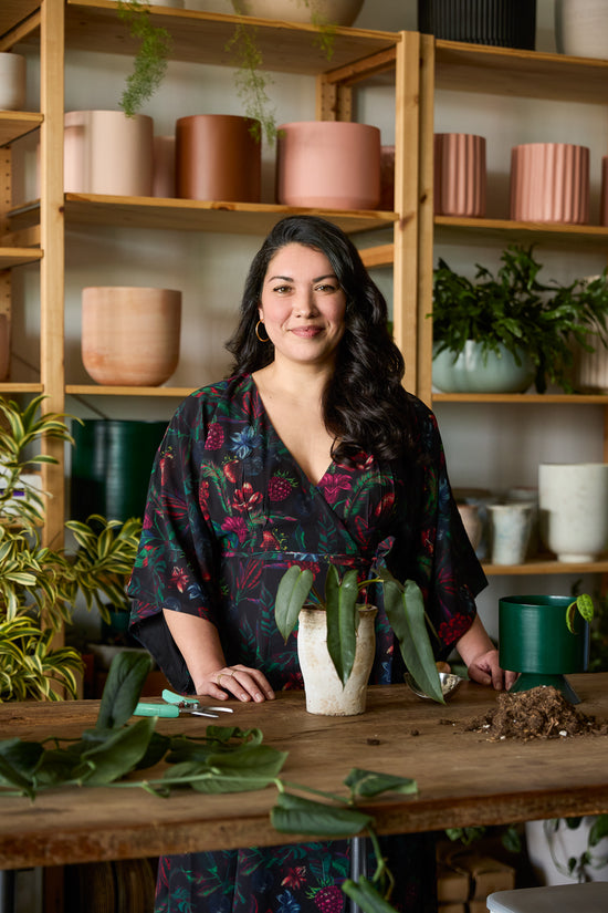 Woman smiling in Maxi Dress in Juniper.