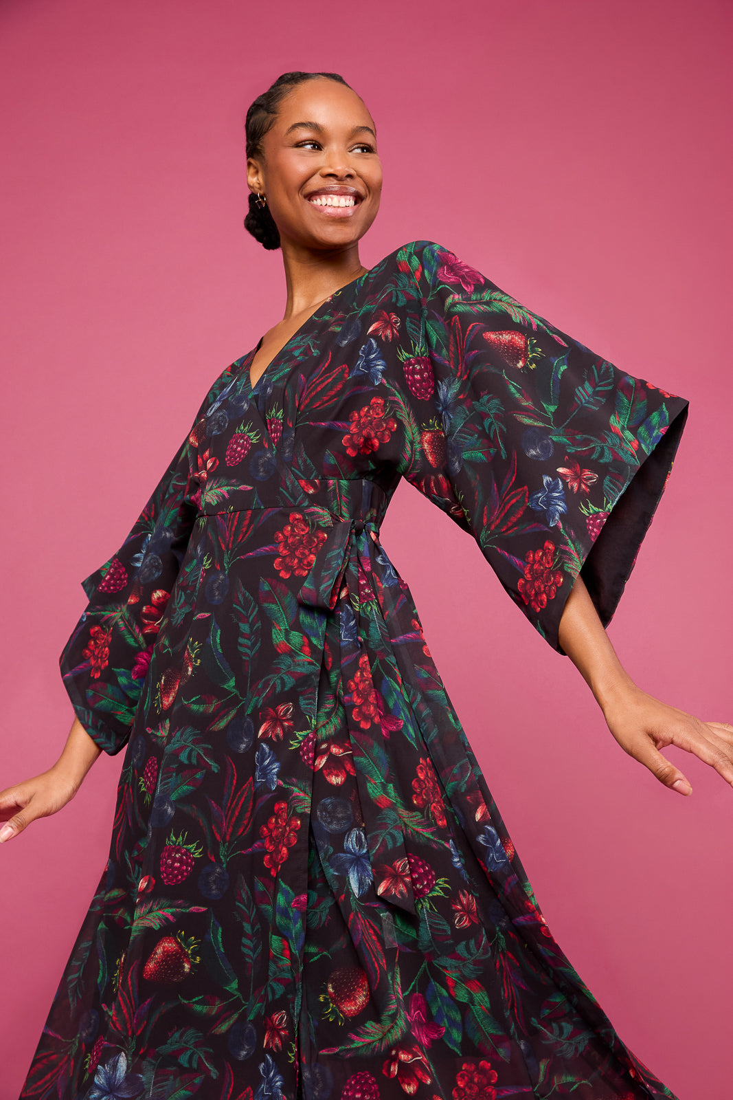 Woman smiles in Maxi Dress in Juniper.